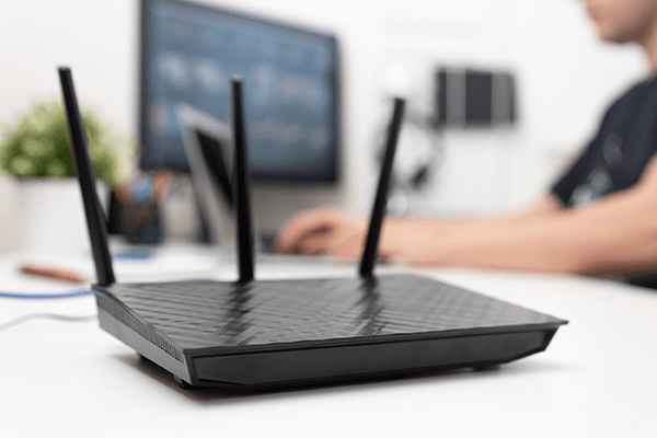 Man working on wireless network equipment