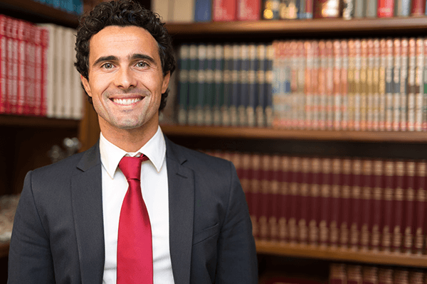 Smiling paralegal in a law library