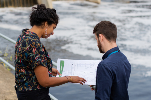 Engineers planning a dam project