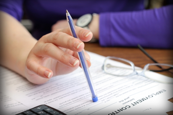 Woman reviewing an employment contract