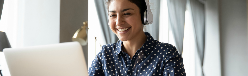 Smiling woman taking an online training class