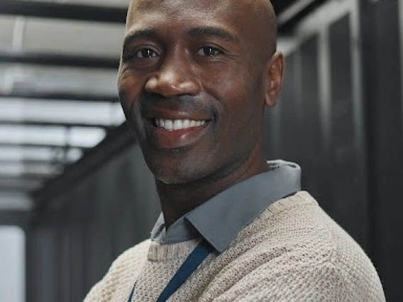 Smiling CISSP at work