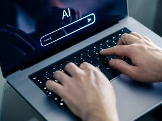 Working on Artificial Intelligence Course On a Laptop