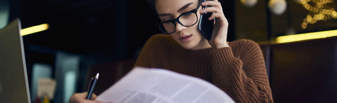 Cannabis Compliance Manager reviewing documents