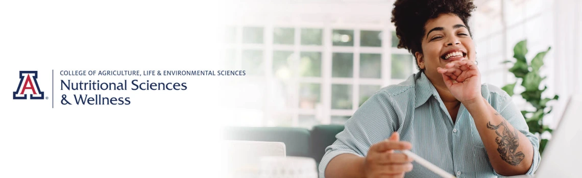 Smiling woman working at her laptop with the University of Arizona CALES Nutritional Sciences and Wellness logo superimposed on the left