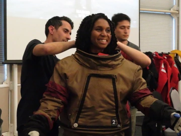Spacesuit training course students and instructor