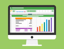 Computer screen showing spreadsheets, charts and graphs