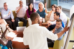 Man facilitating meeting