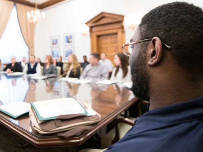 Group of policy-makers and scientists attending a meeting