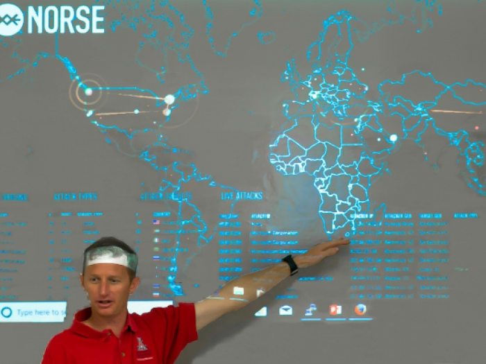 Instructor teaching cybersecurity class