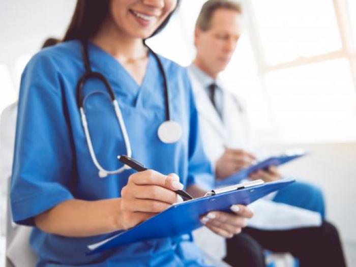 Spanish-English Medical Translation Bilingual medical professional taking notes