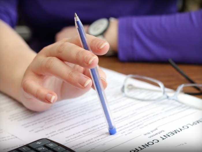 Woman reviewing an employment contract