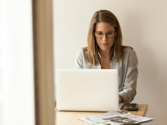 Cybersecurity professional working on a computer