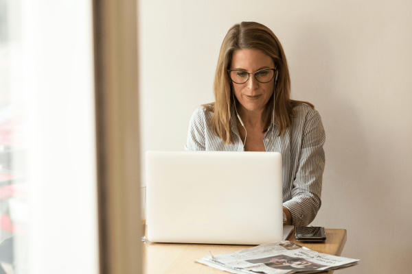 Cybersecurity professional working on a computer